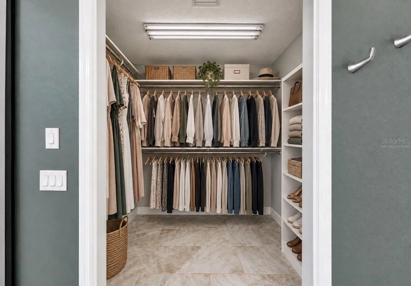 Virtually staged- Walk In Closet in Primary Suite