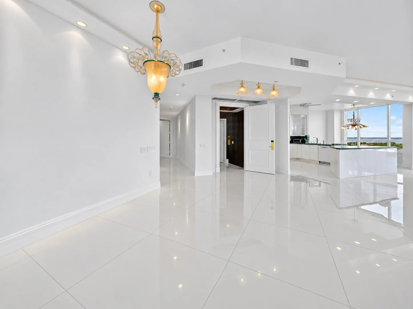 Den looking into living room and foyer