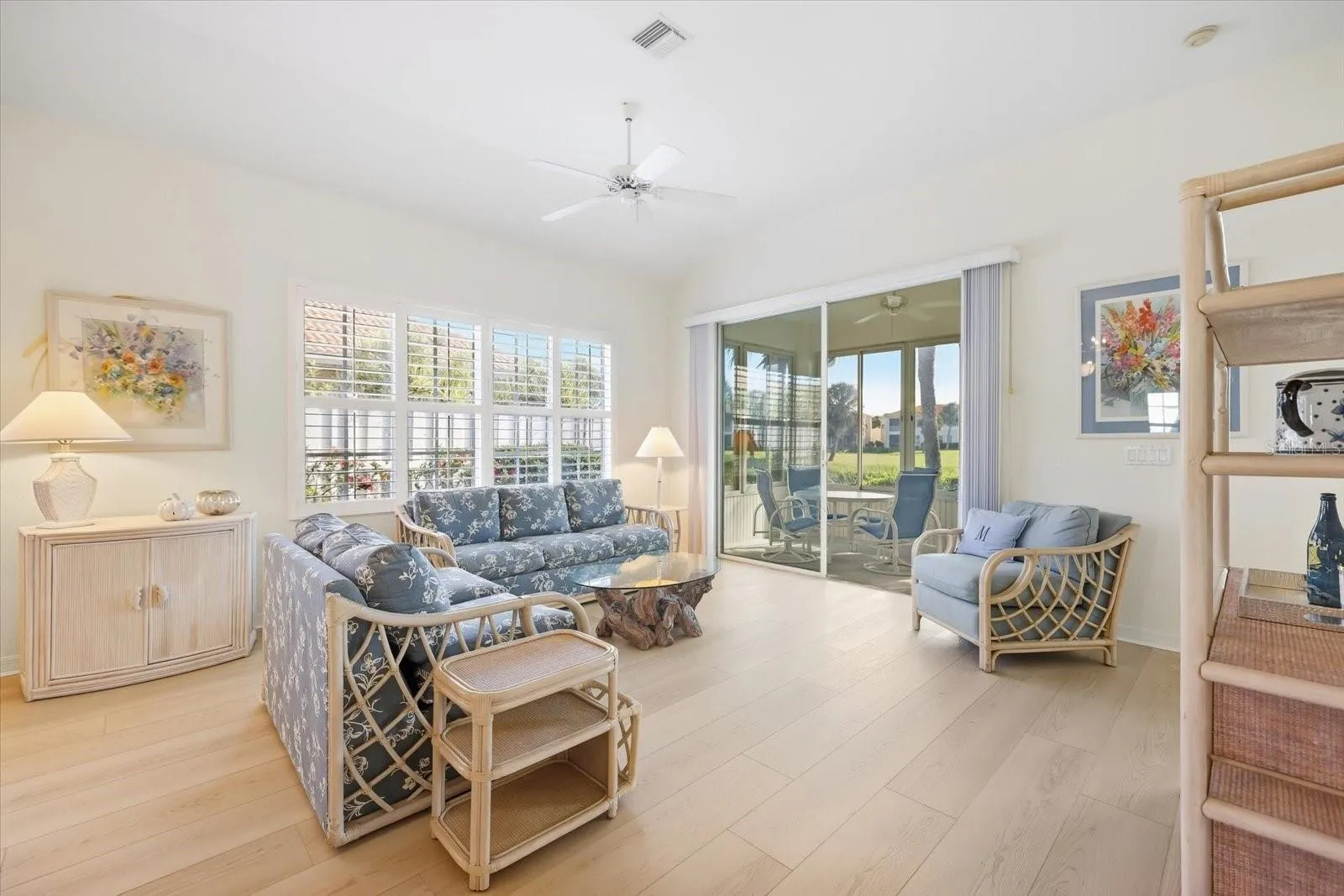 Living room facing back lanai sliders