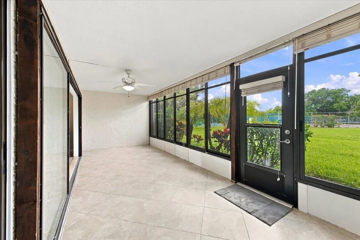 Florida view looking at tennis court/pickleball courts