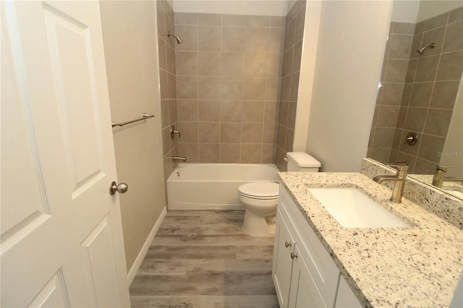 Guest Bathroom.. Tub/Shower combo with nice tile walls in shower...