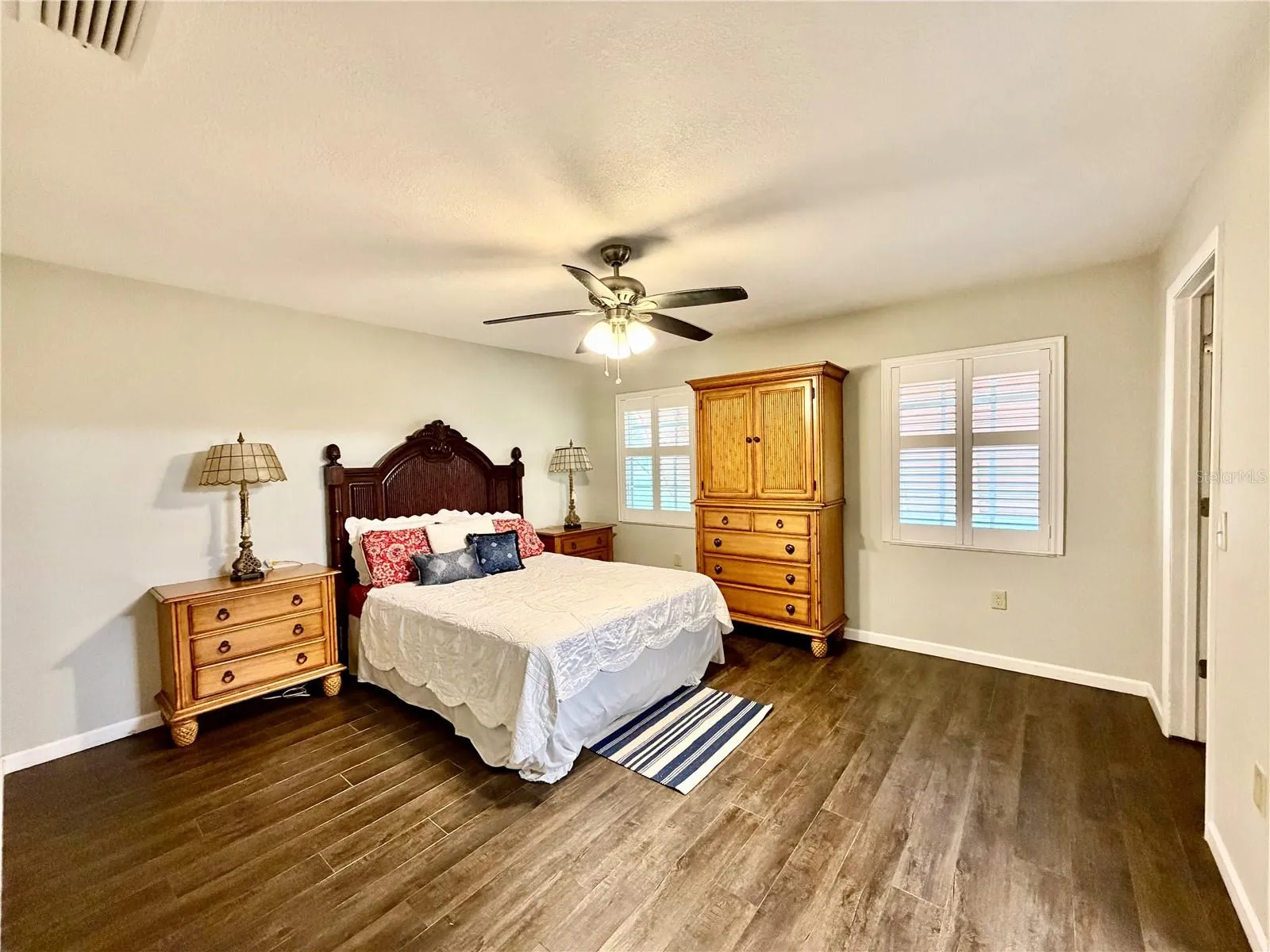 Over-sized primary suite with plenty of room for furniture or a corner chair