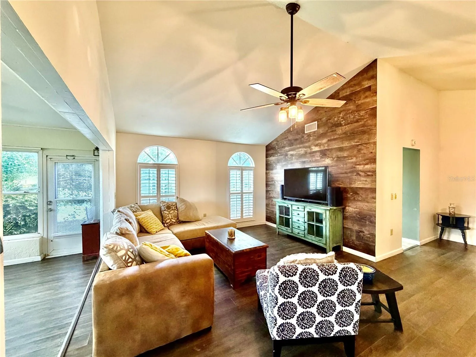 Vaulted ceilings, plantation shutters and bright & airy
