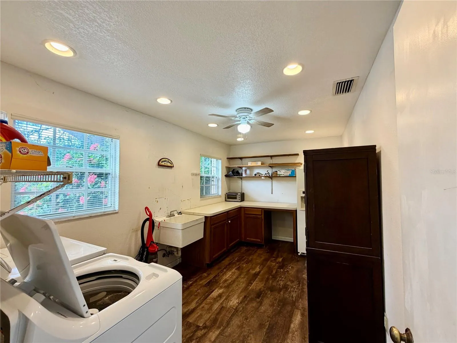 Laundry room with a utility sink makes this a bonus room