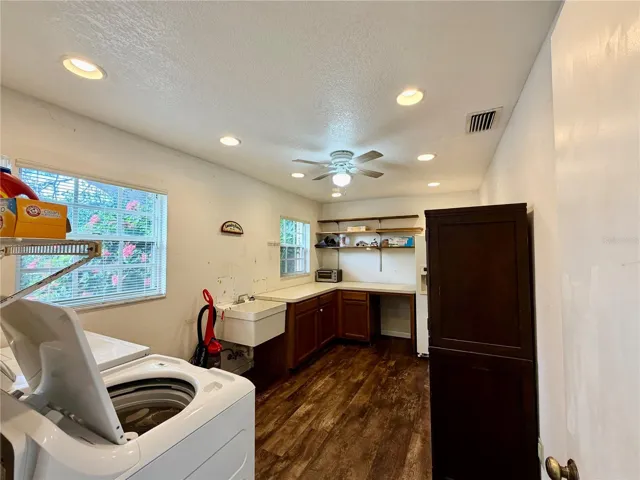 Laundry room with a utility sink makes this a bonus room