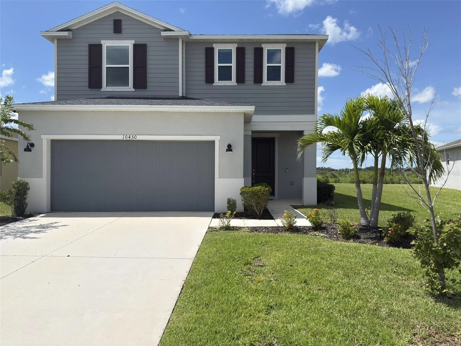 Welcome Home: Front Exterior fresh landscaping