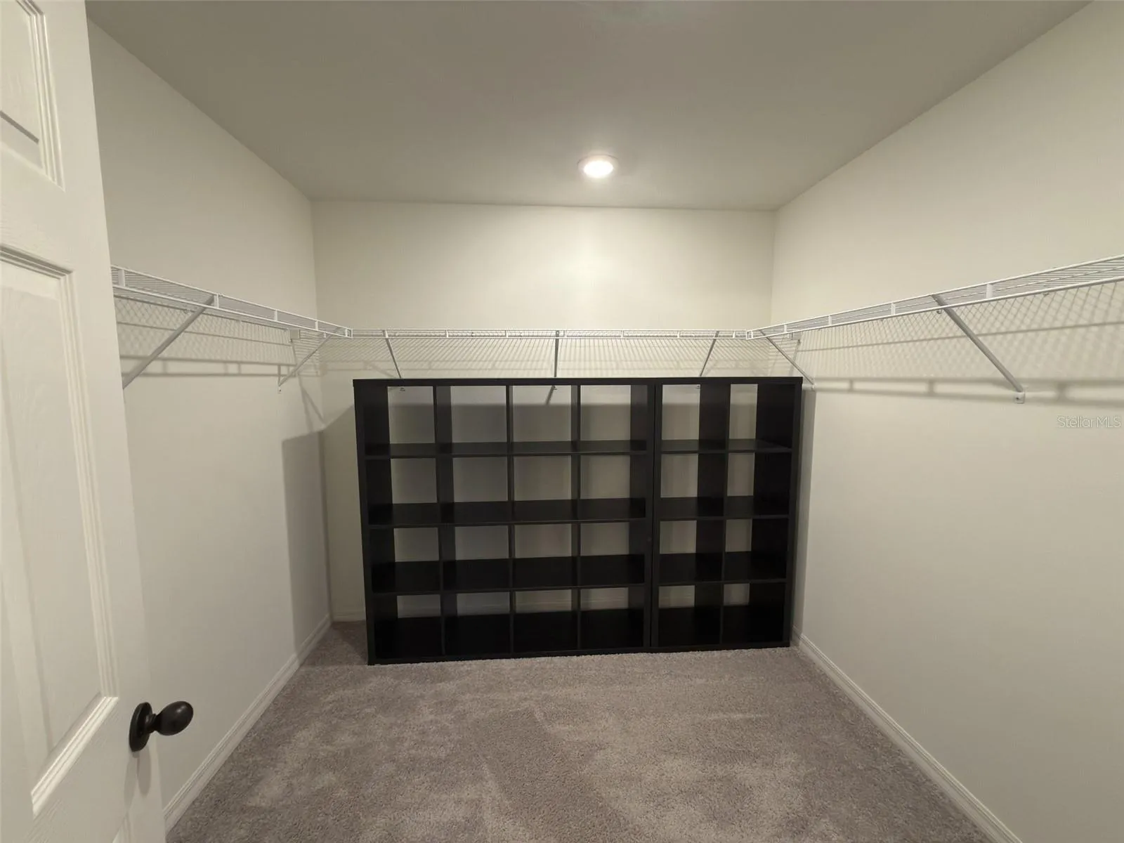Walk in closet- from primary bathroom