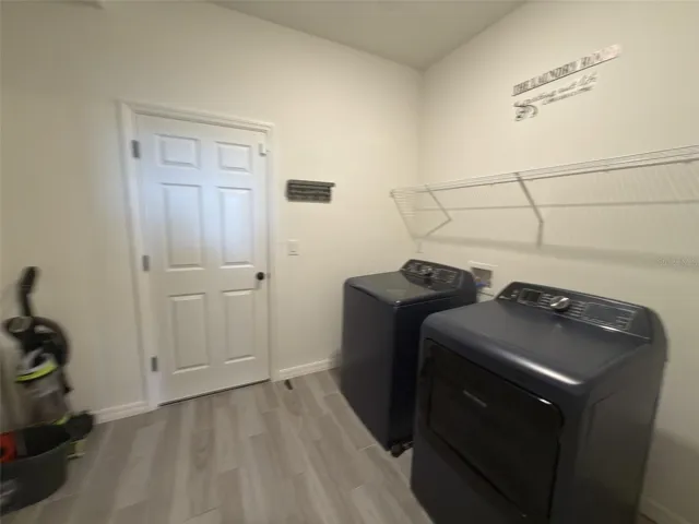 Laundry room with washer and dryer