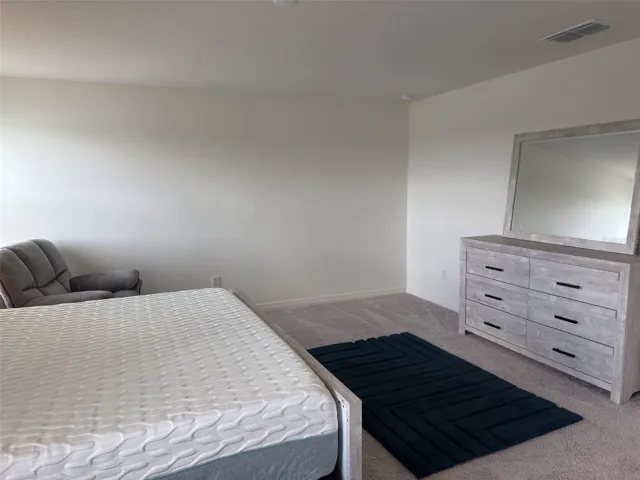 Primary bedroom with dresser