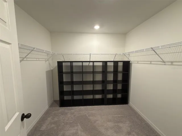 Walk in closet- from primary bathroom