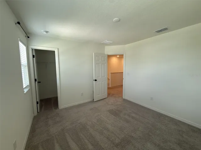 2nd bedroom facing closet