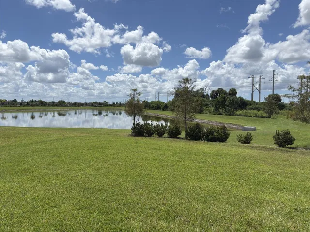 Rear Exterior facing beautiful pond