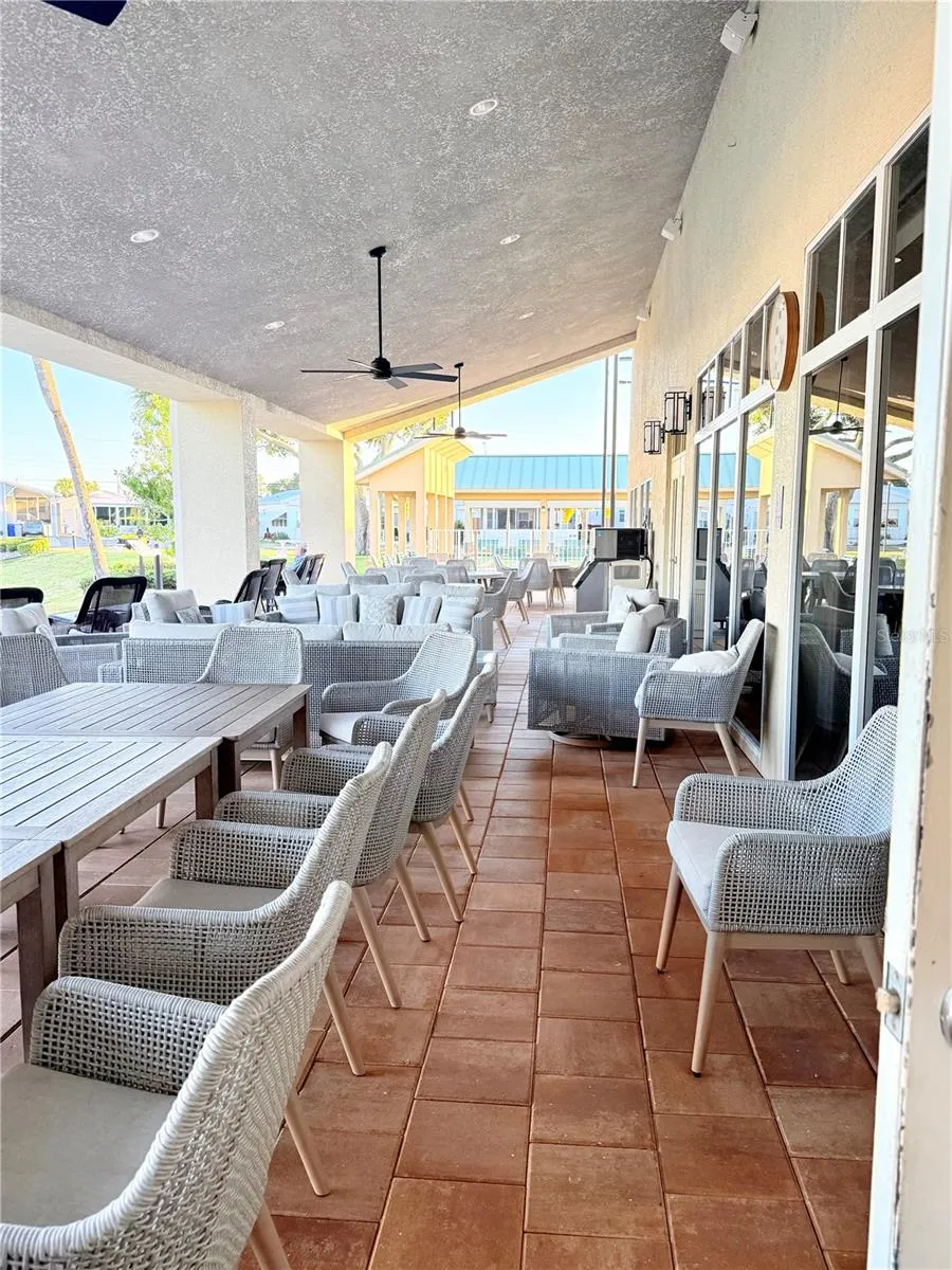 Outdoor seating by the Venitian Waterway