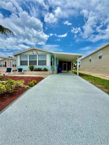 Front of Home with custom driveway