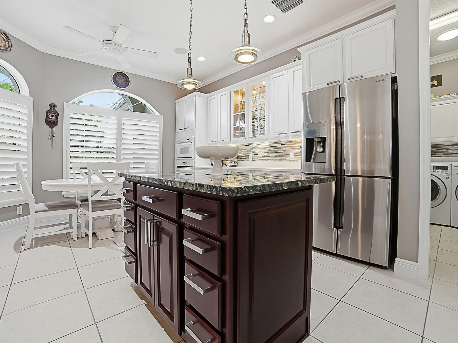 THIS KITCHEN IS LARGE ENOUGH FOR AN ISLAND (MOVABLE IF DESIRED) WITH PENDANT LIGHTING, AND NEWER BOTTOM FREEZER REFRIGERATOR.