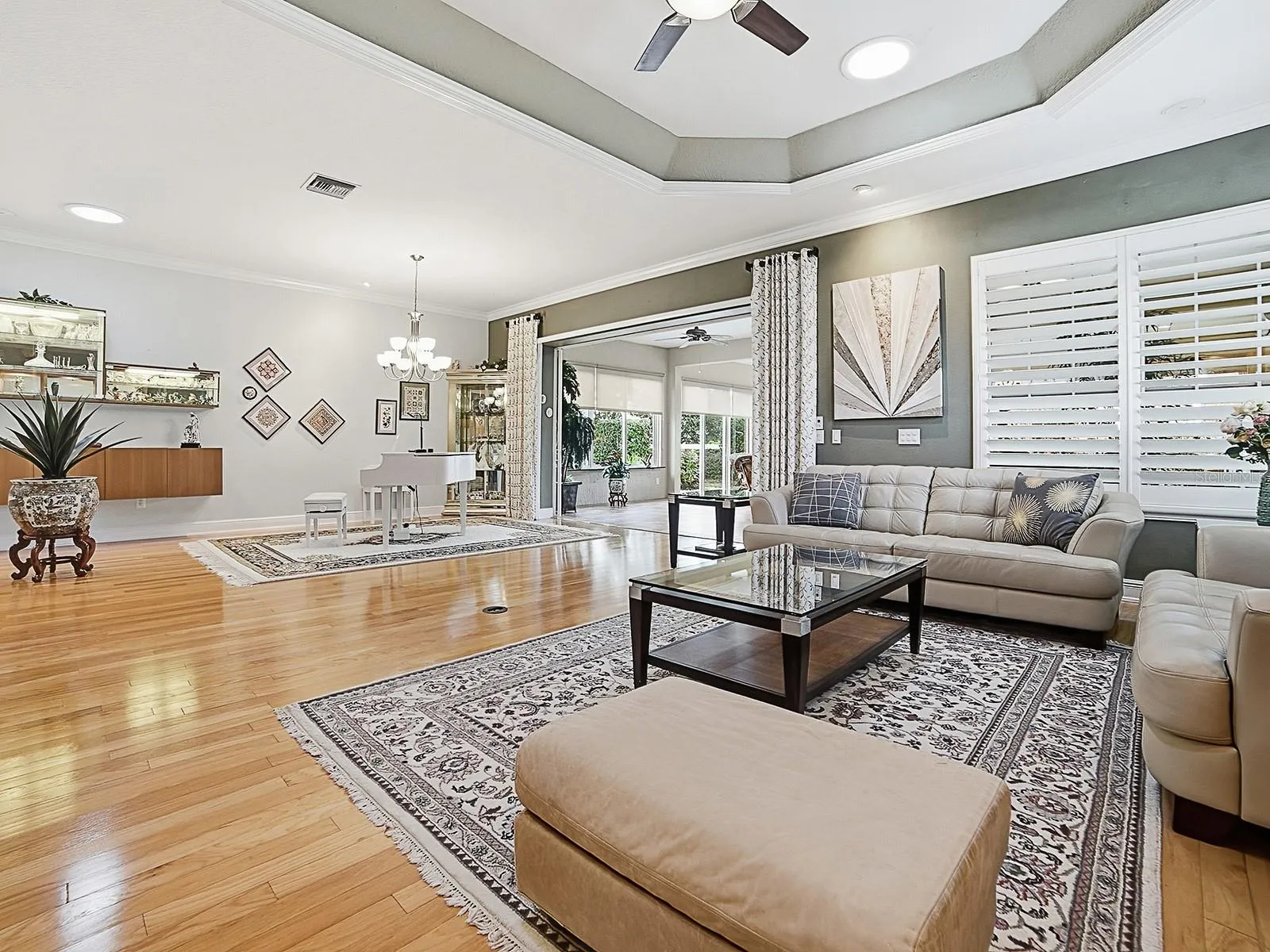 ANOTHER VIEW OF THIS SPACIOUS LIVING AREA.  WHAT A SPECTACULAR ROOM AND IT FLOWS BEAUTIFULLY INTO THE 865 SQ. FT. "SUN ROOM".