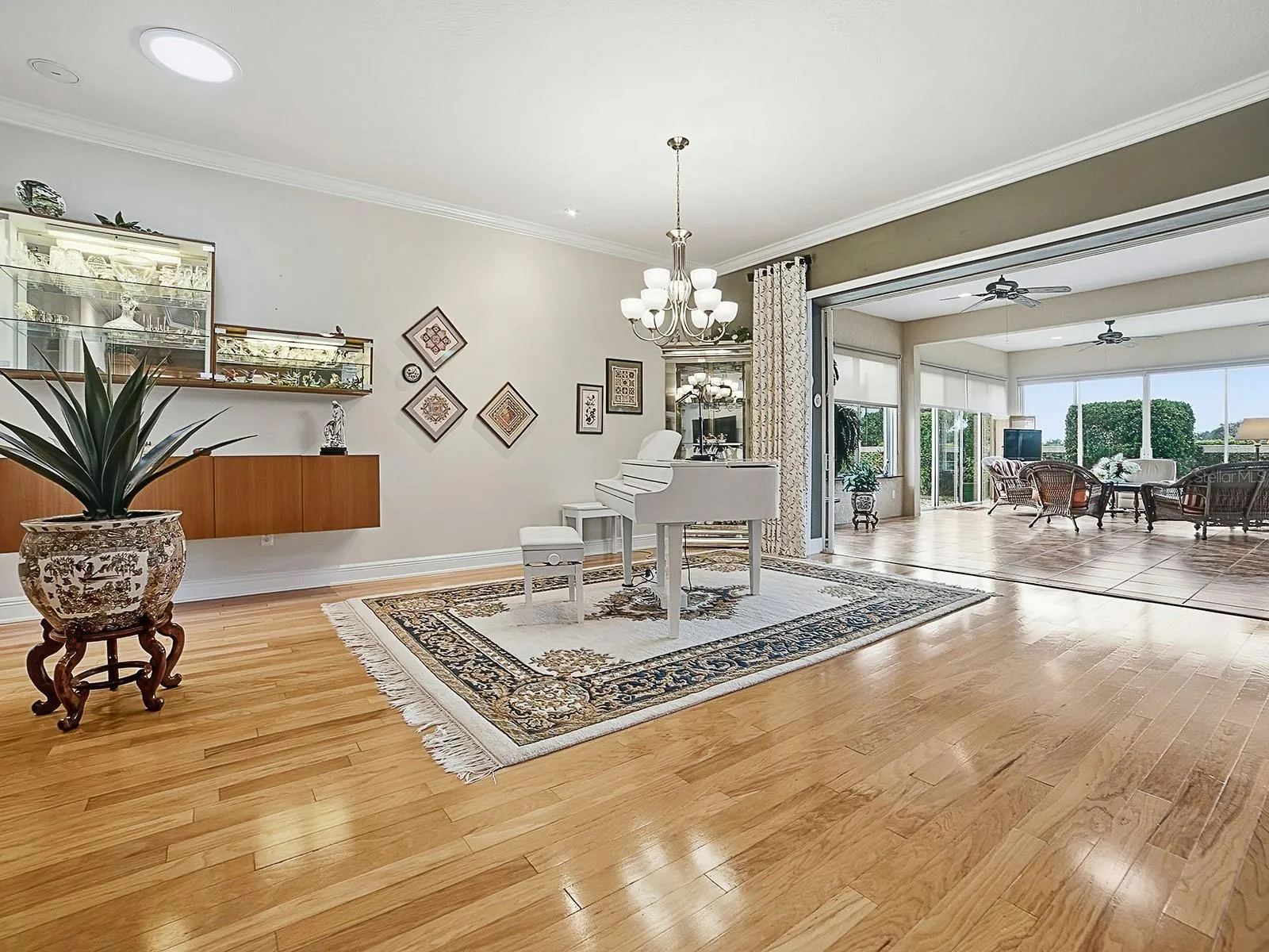 FLOATING CABINET AND SHELVING WAS ADDED IN THE DINING AREA AND A SOLAR TUBE FOR MORE NATURAL LIGHTING.