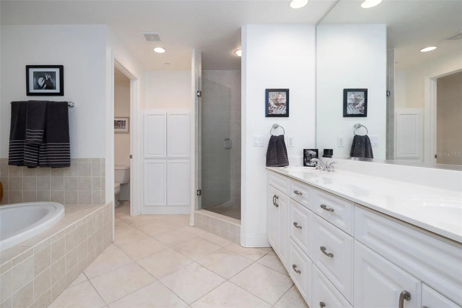 Master bath has two sinks, garden tub & step in shower.