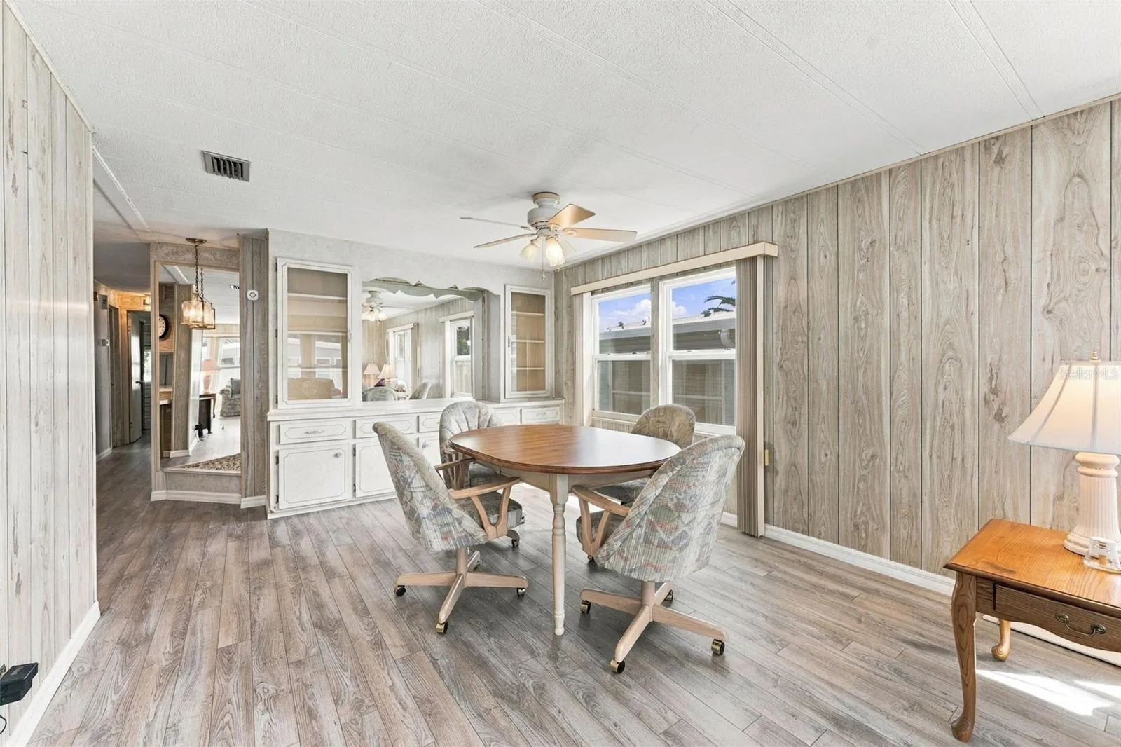 Dining room with built in shelving and storage