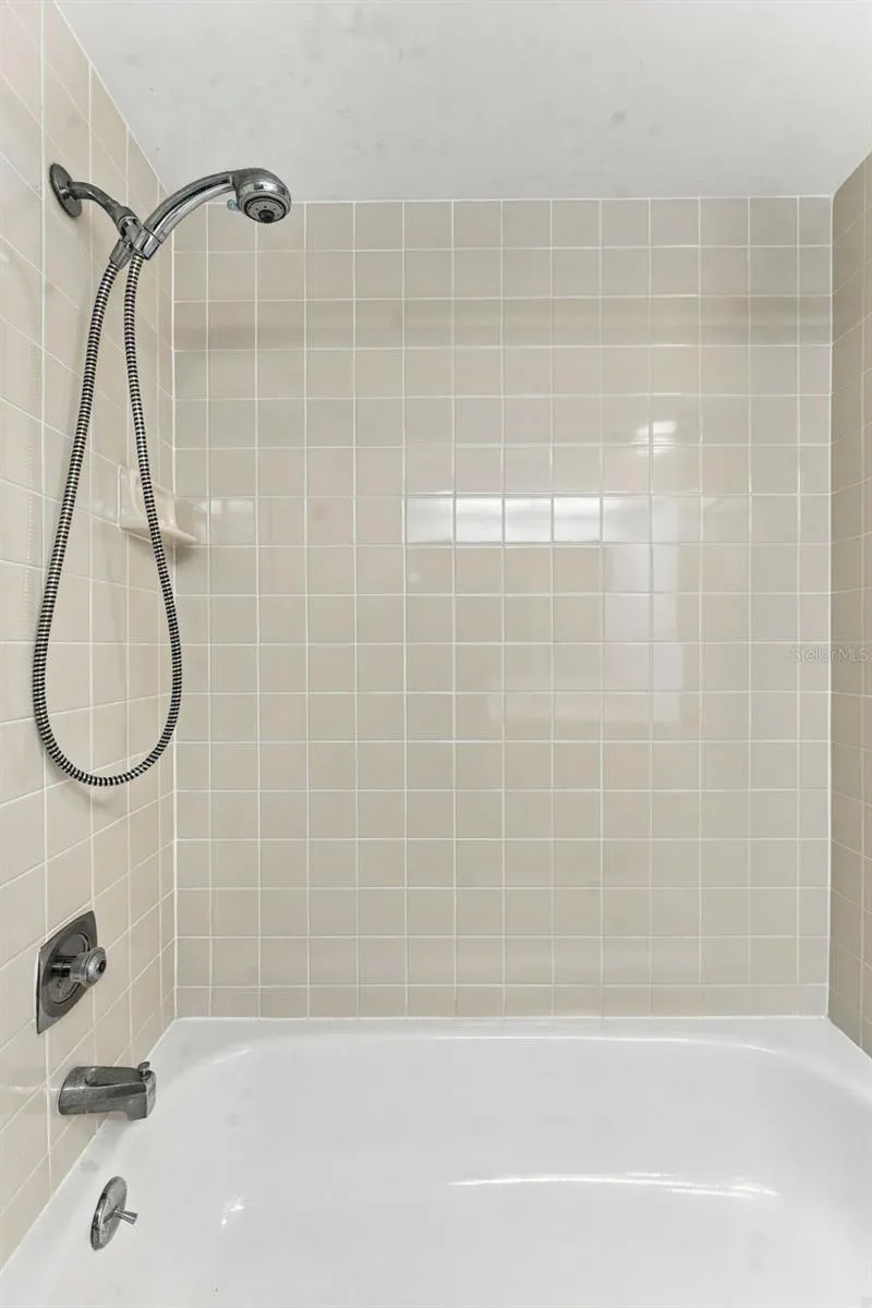 Hall bathroom with tub/shower combo