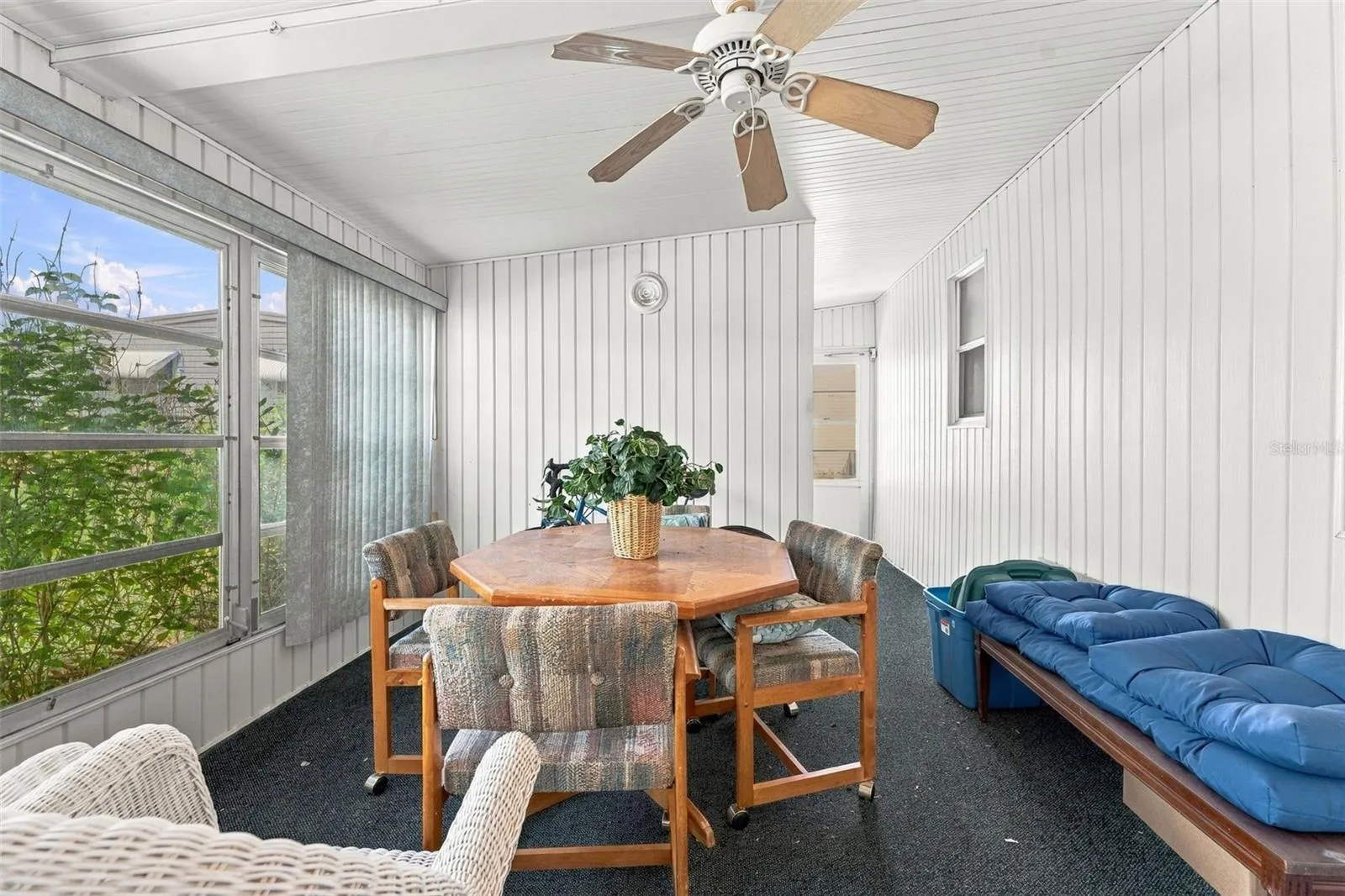 Florida room located at the back of the car port