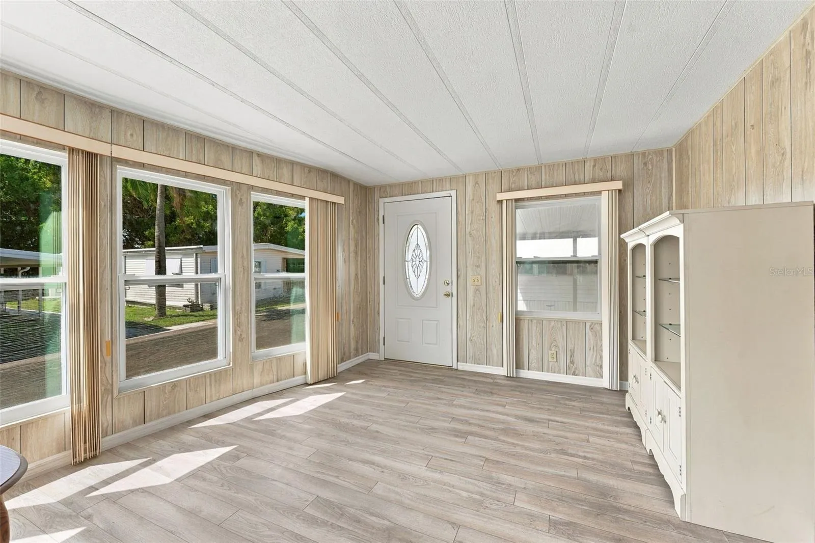 Upon entering the front door, living room is wide and spacious