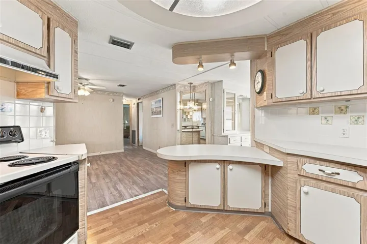 Kitchen view looking out towards the family room/dinette