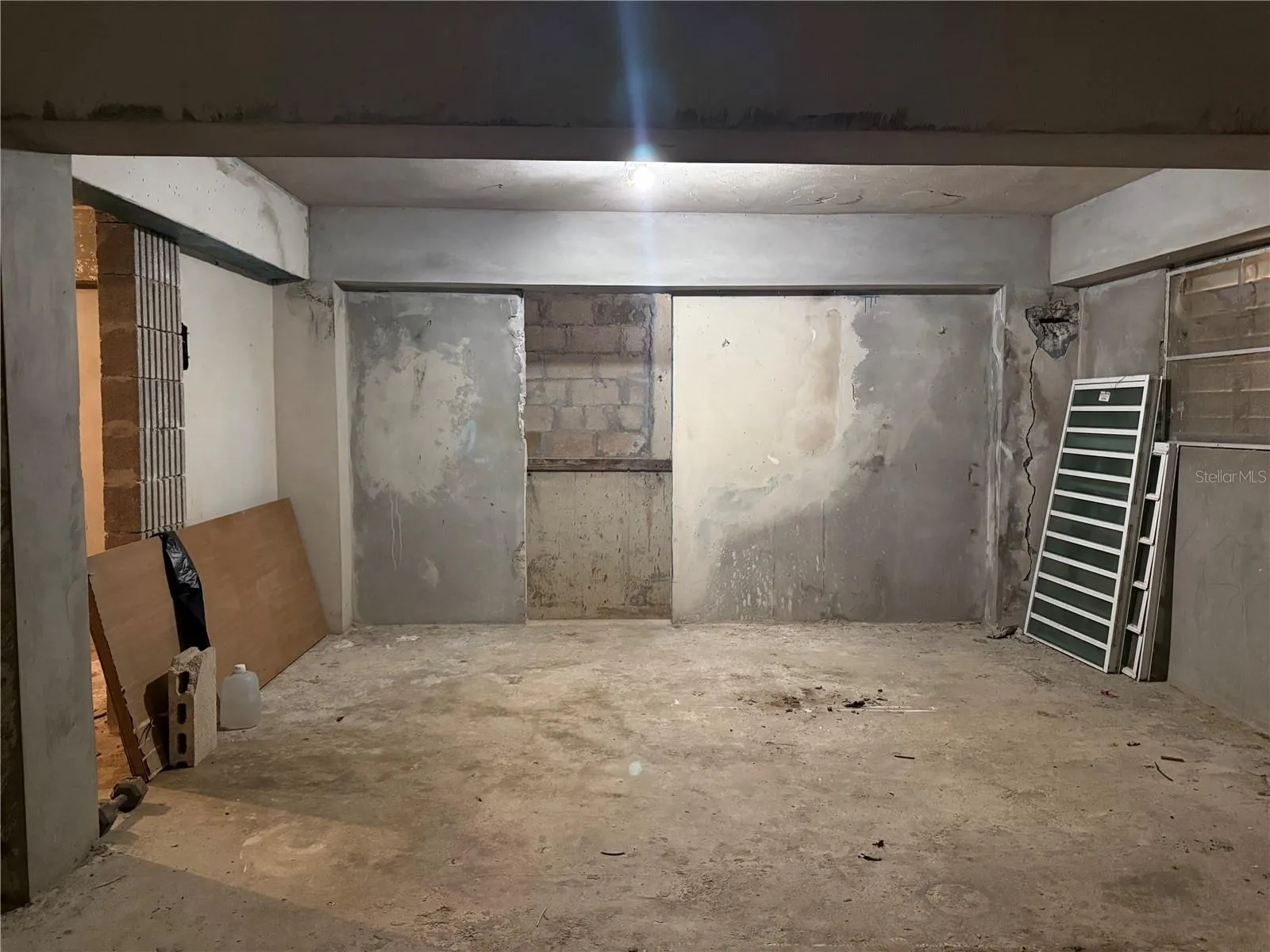 Dry storage full of potential to be the bedroom of a new unit.