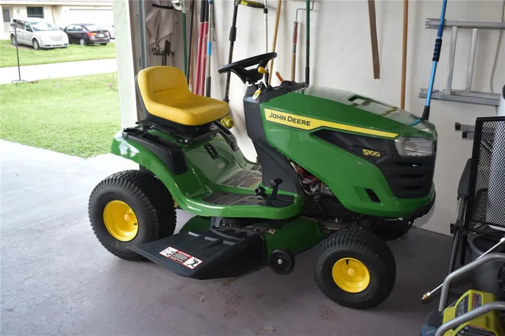 The riding lawn mower may be included with the sale of the property.