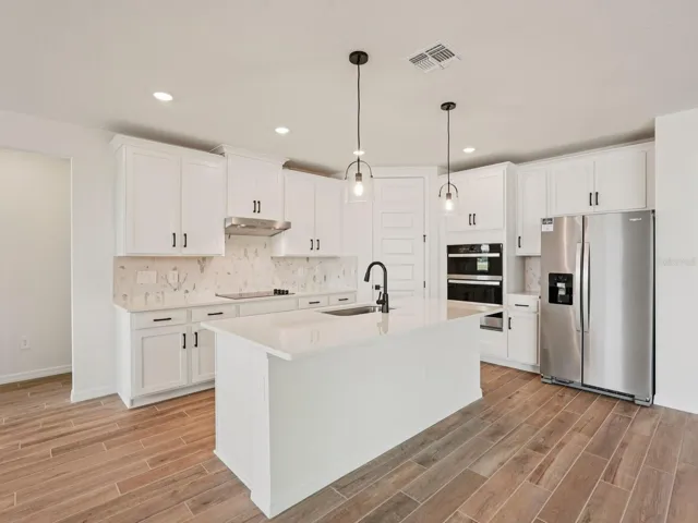 Photo is not of the actual home, but is an inspirational photo of builder’s model home and may depict options, furnishings, and/or decorator features that are not included