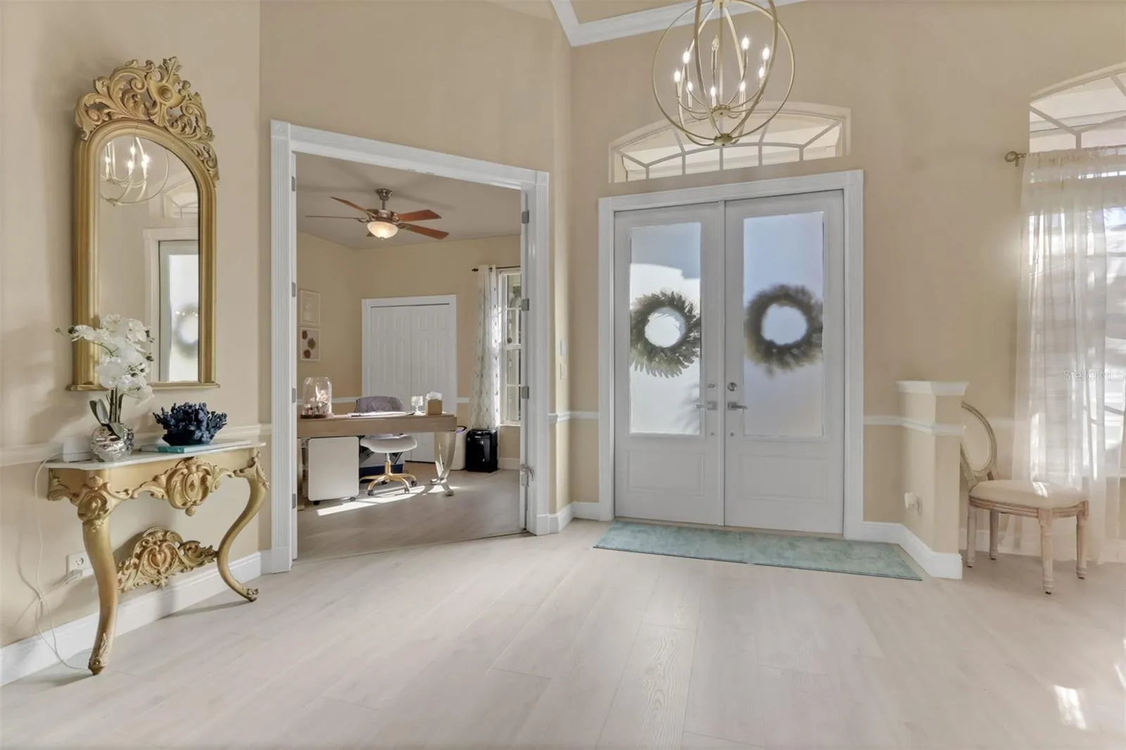 Entry to formal living room, dining area and office