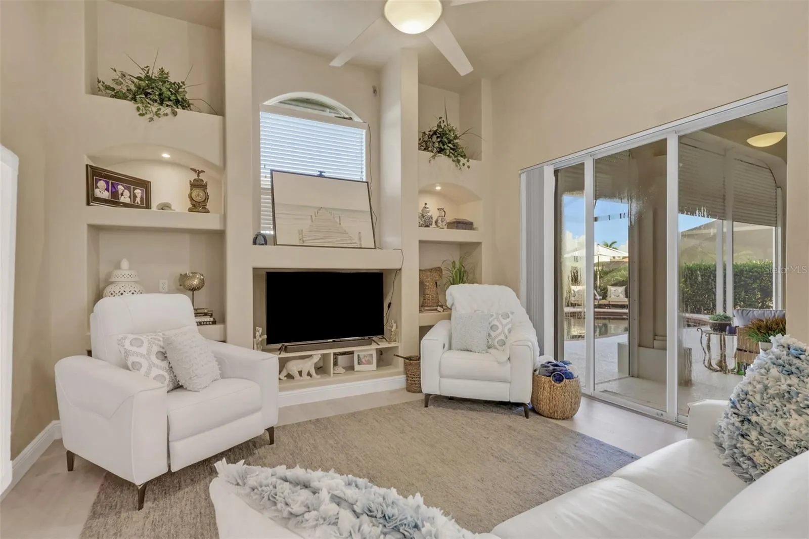 family room with sliders to lanai area