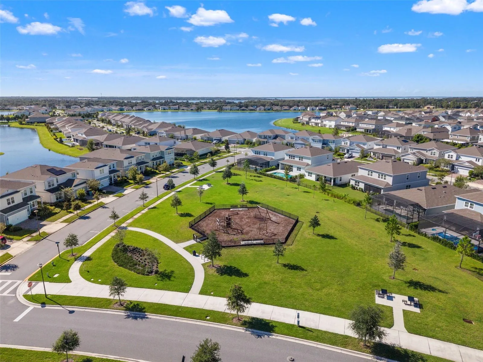 Aerial View of Greenspace & Playground behind Home