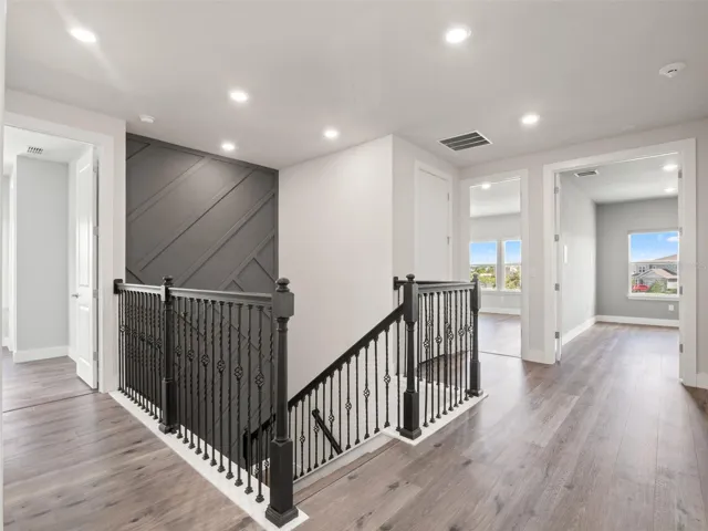 Upstairs Landing looking at Media Room & Primary