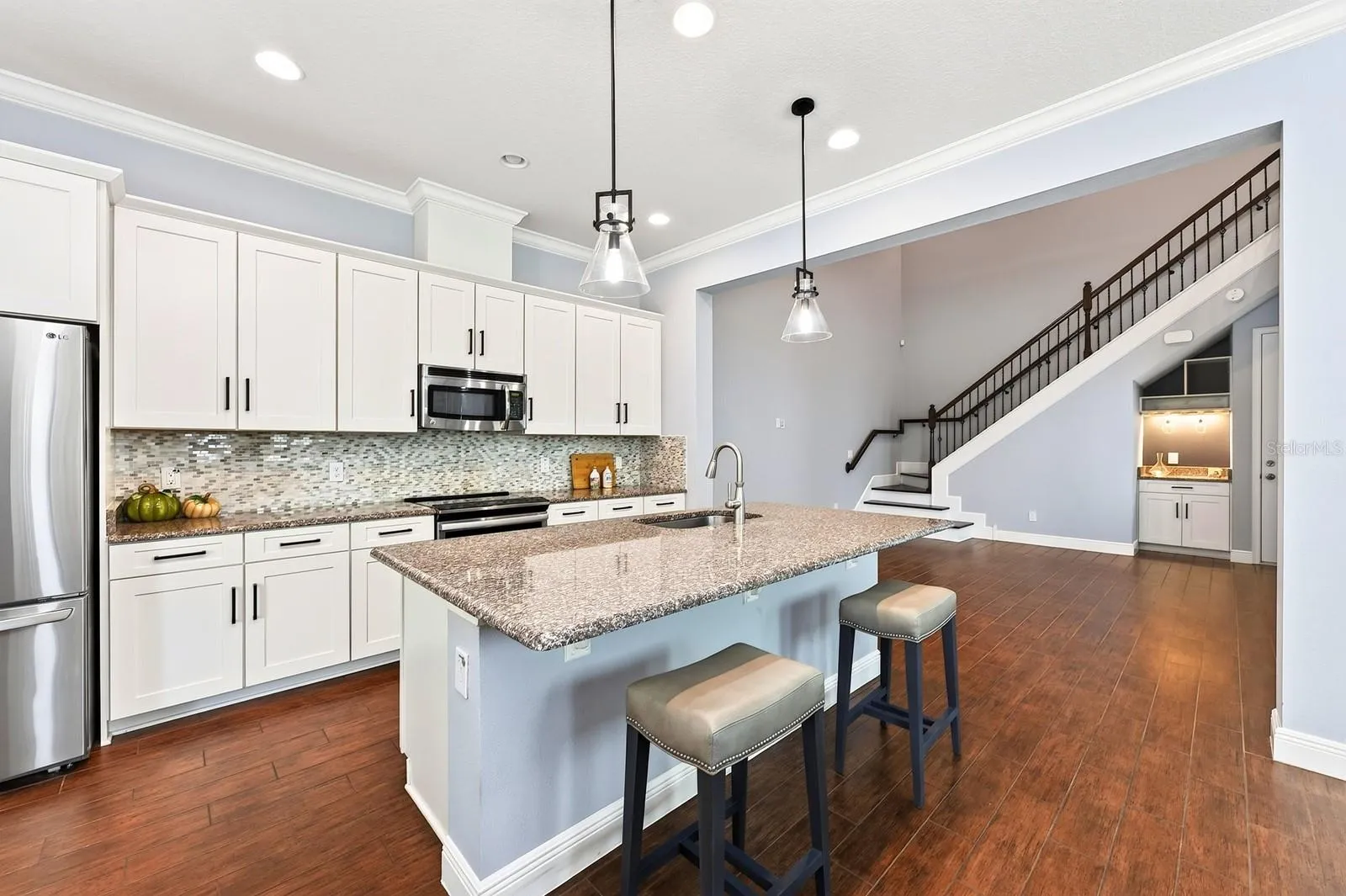 Seamless flow into the two story living room.