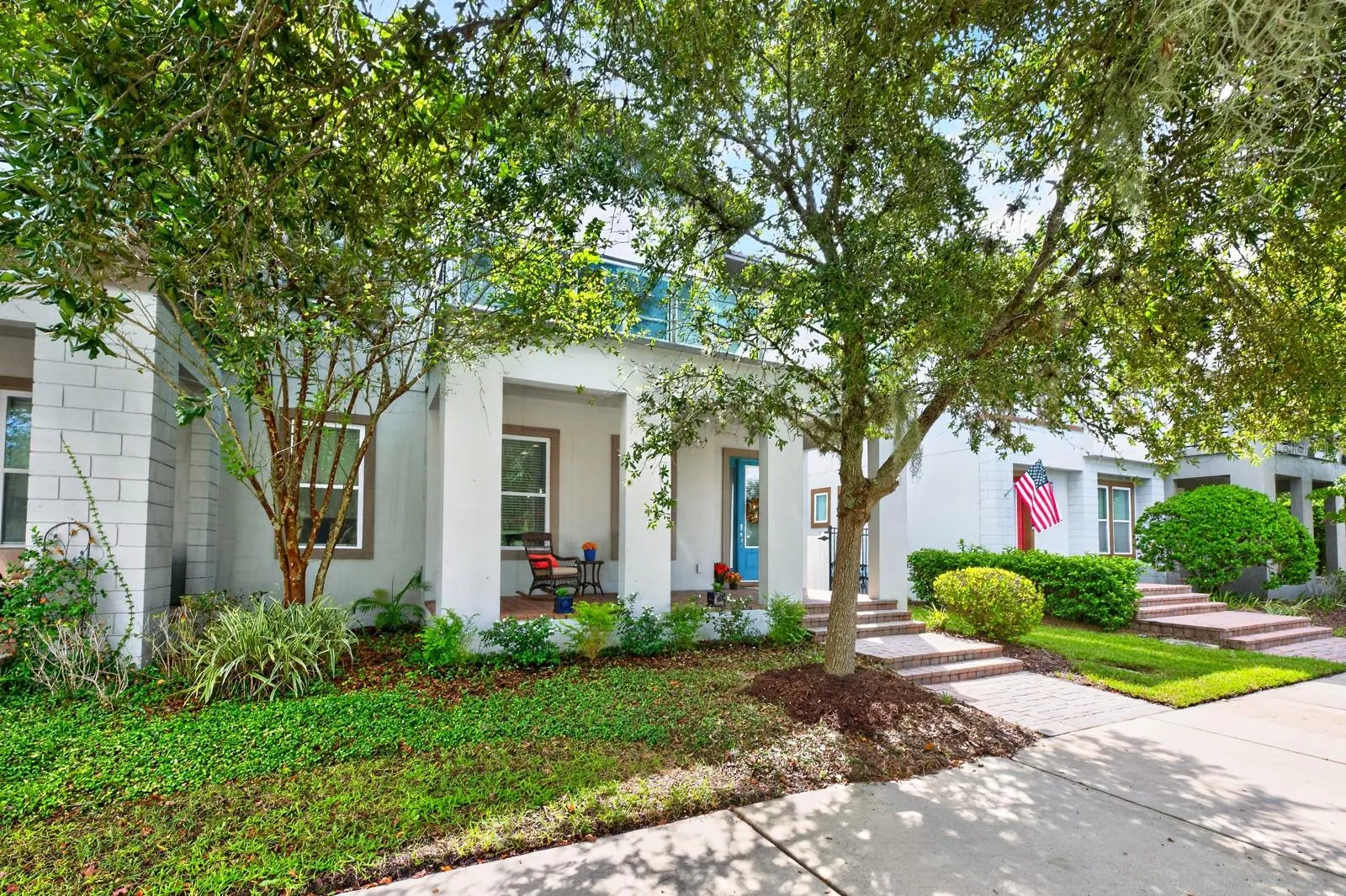 Welcome to the tree-lined streets of Laurate Park in Lake Nona!
