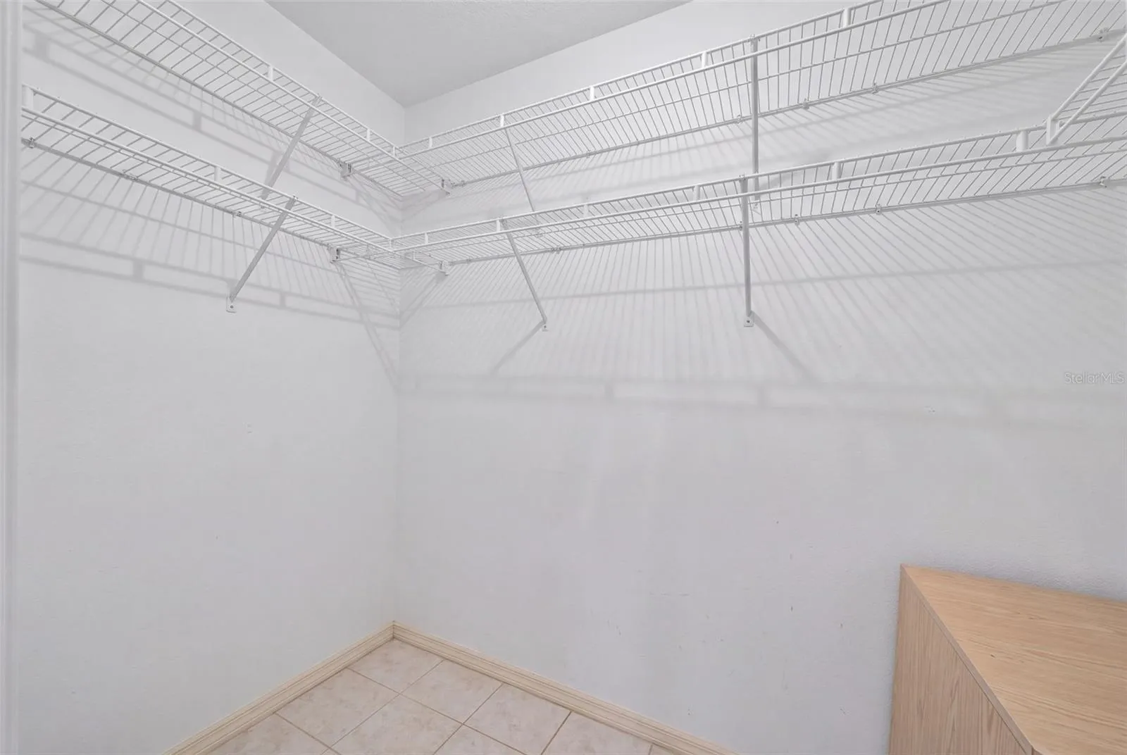 large walk-in closet for bedroom #3