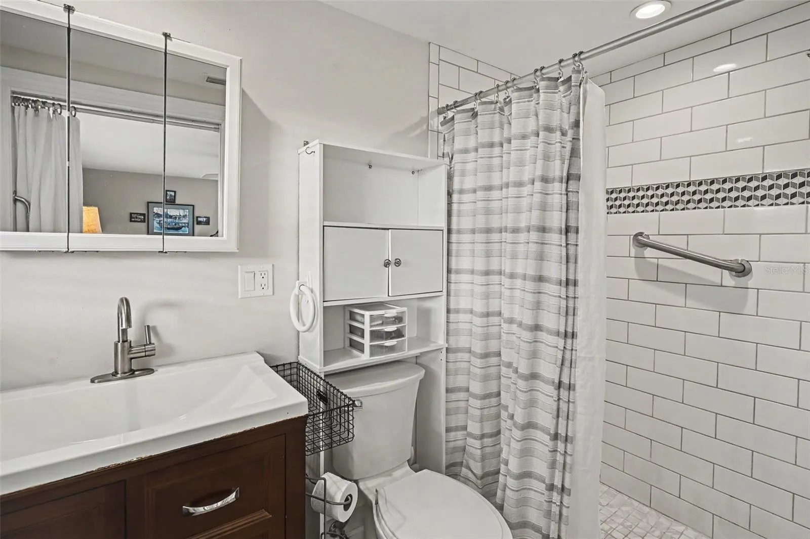 Primary ensuite adjacent bathroom at 412 Redwood Road, Venice, Florida