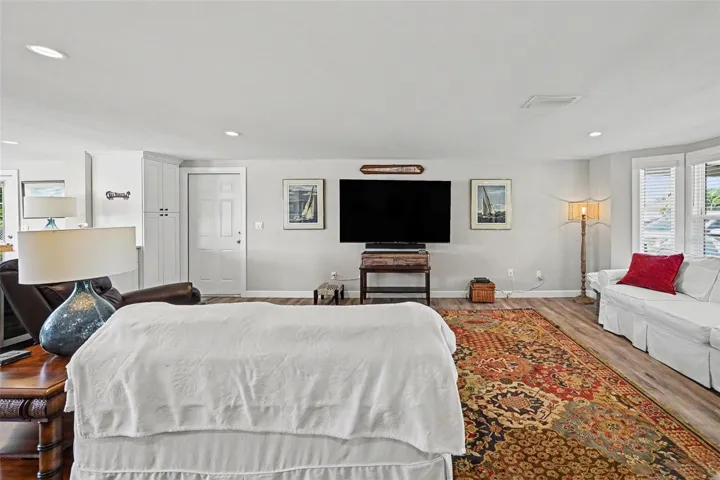 Spacious living room with a media area at 412 Redwood Road, Venice, Florida