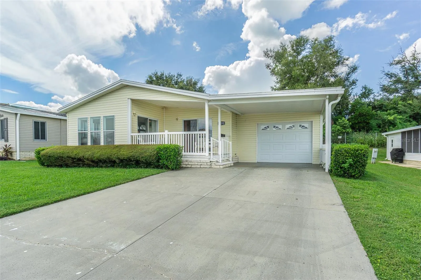 Large driveway and GARAGE!