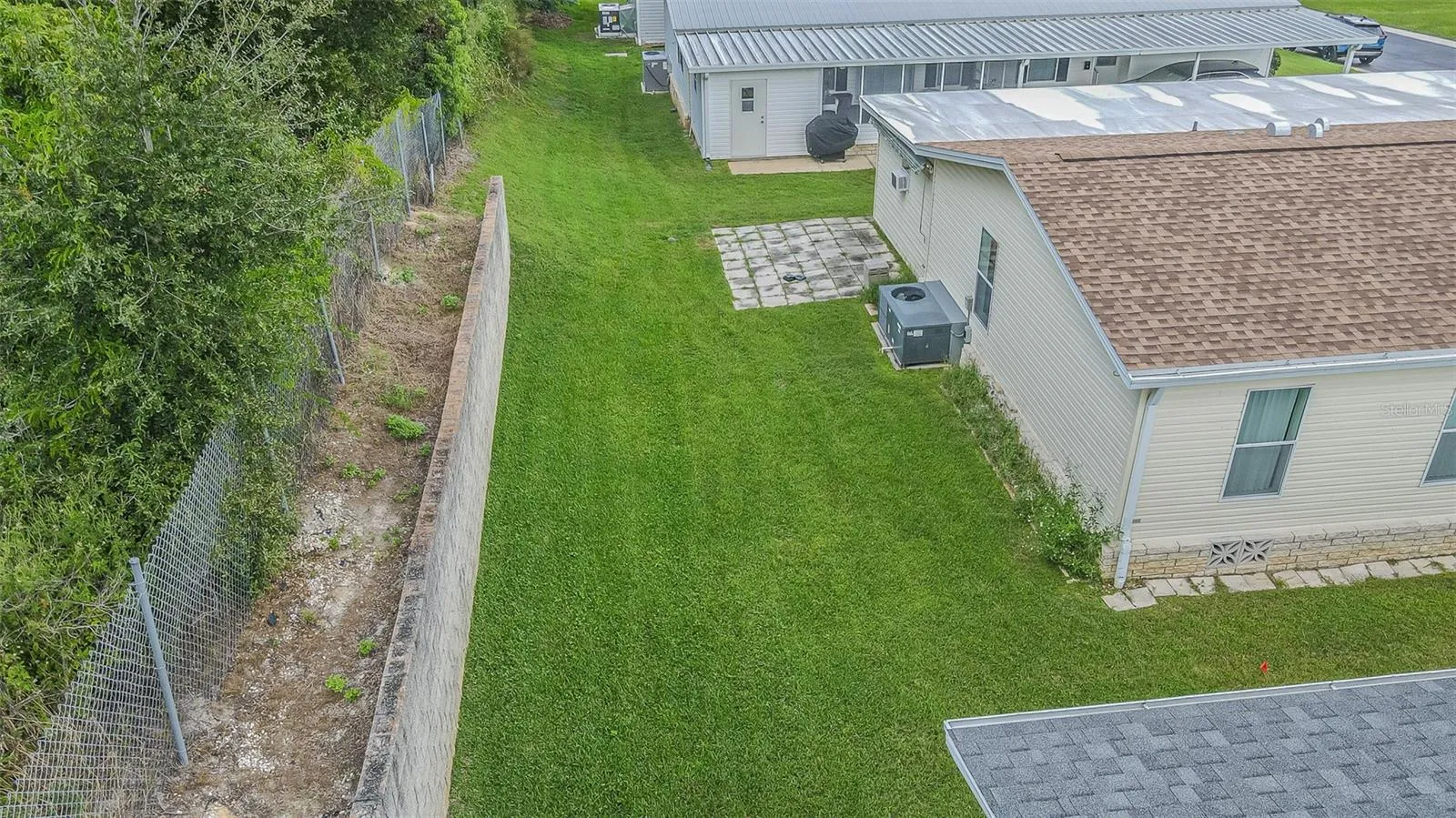Lush backyard with planting area