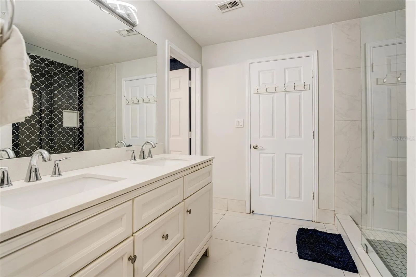 Primary bath with dual vanities