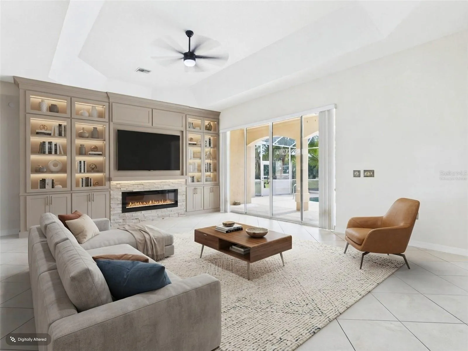 Living Room w/sliders to Pool - virtually staged