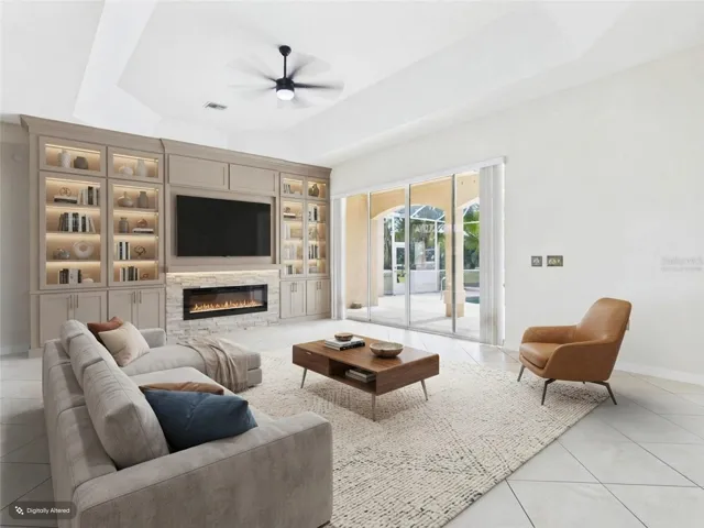 Living Room w/sliders to Pool - virtually staged