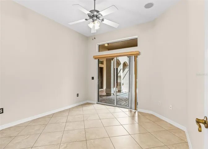 Guest Bedroom with sliders to courtyard