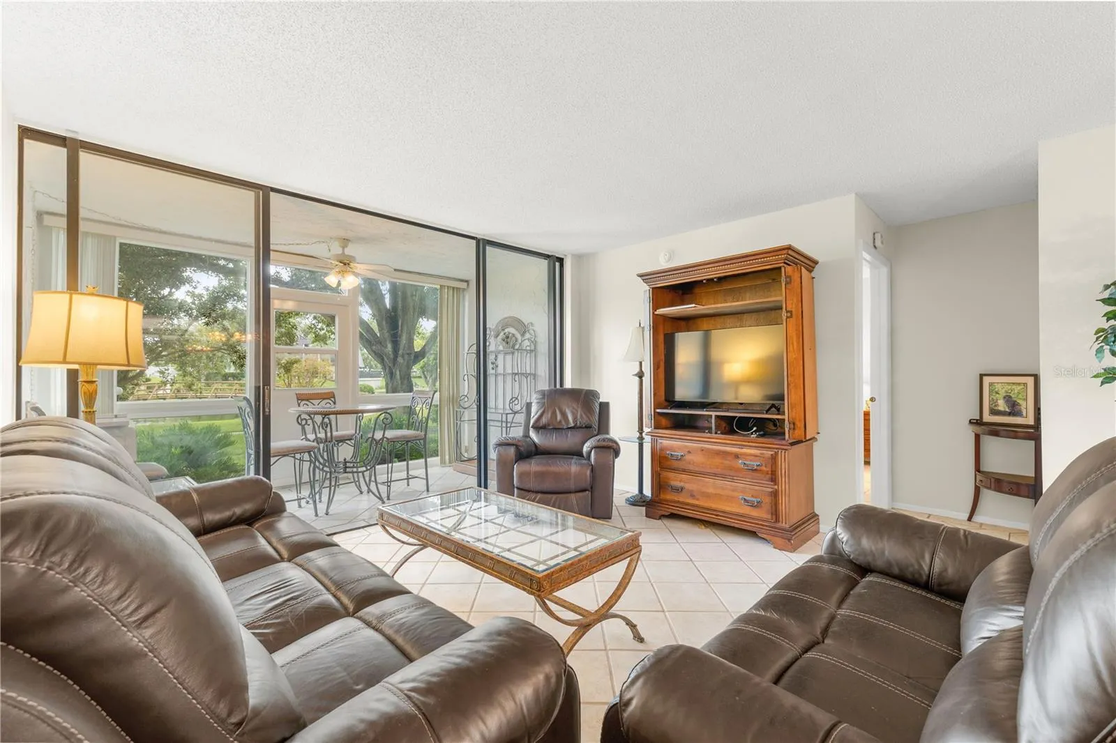 Living room with full lake and fountain view