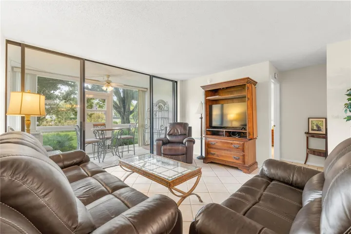 Living room with full lake and fountain view