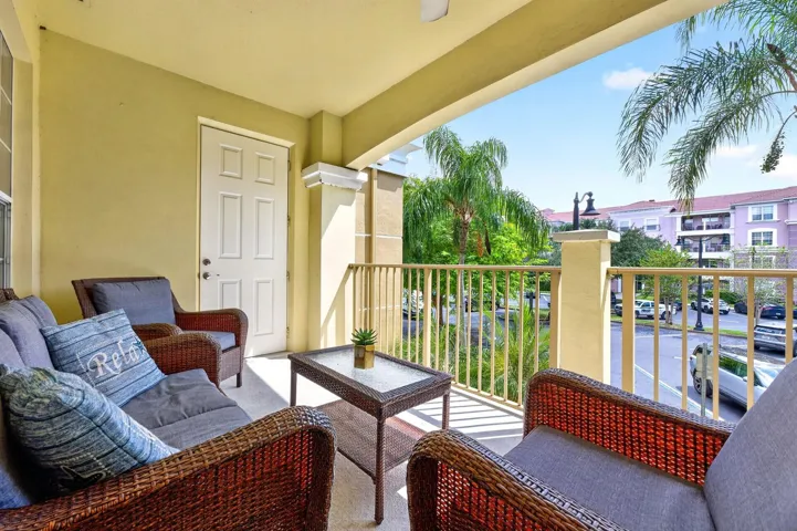 Covered balcony features additonal storage.