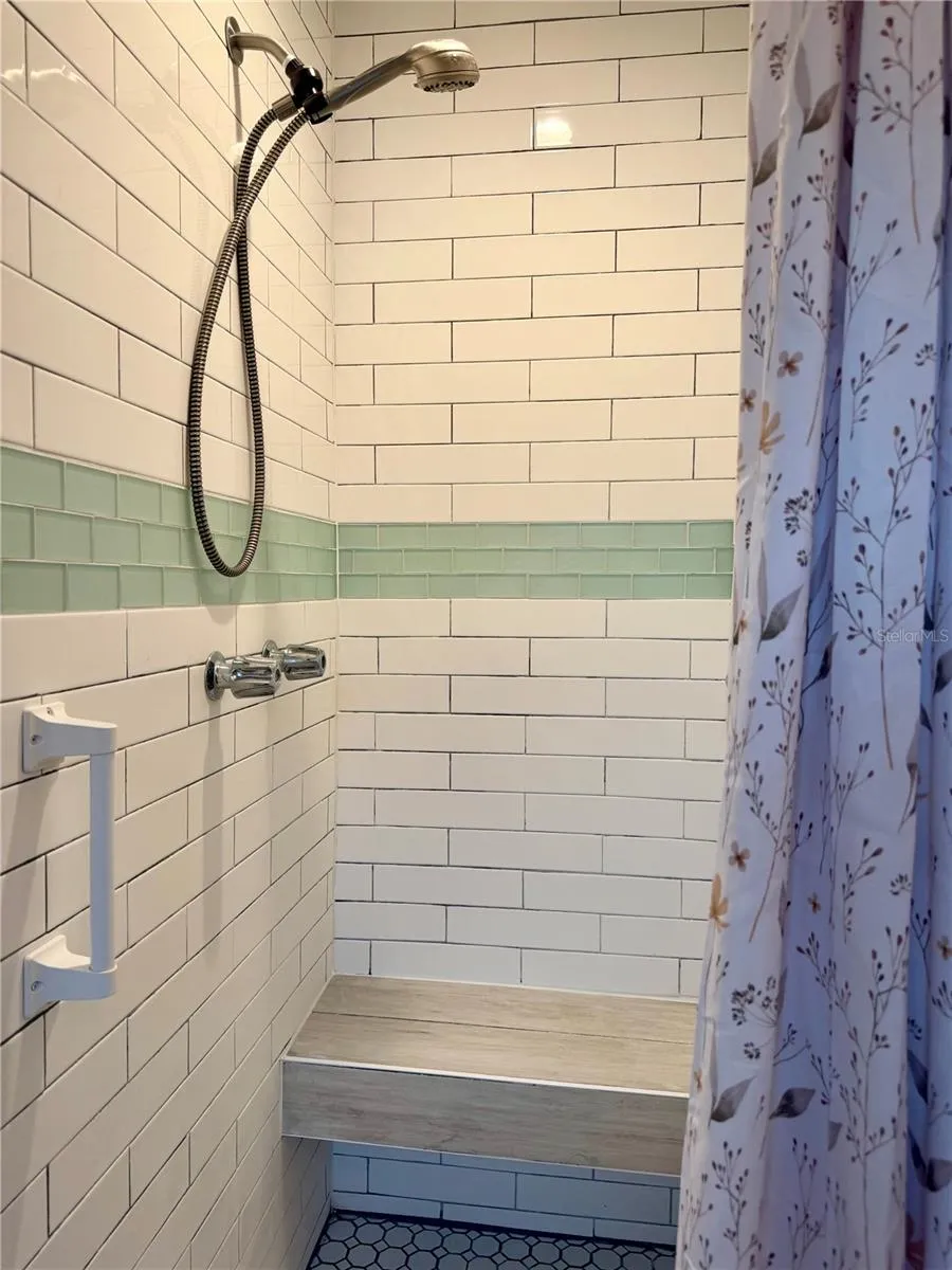 Primary shower with build in bench