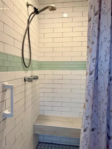 Primary shower with build in bench